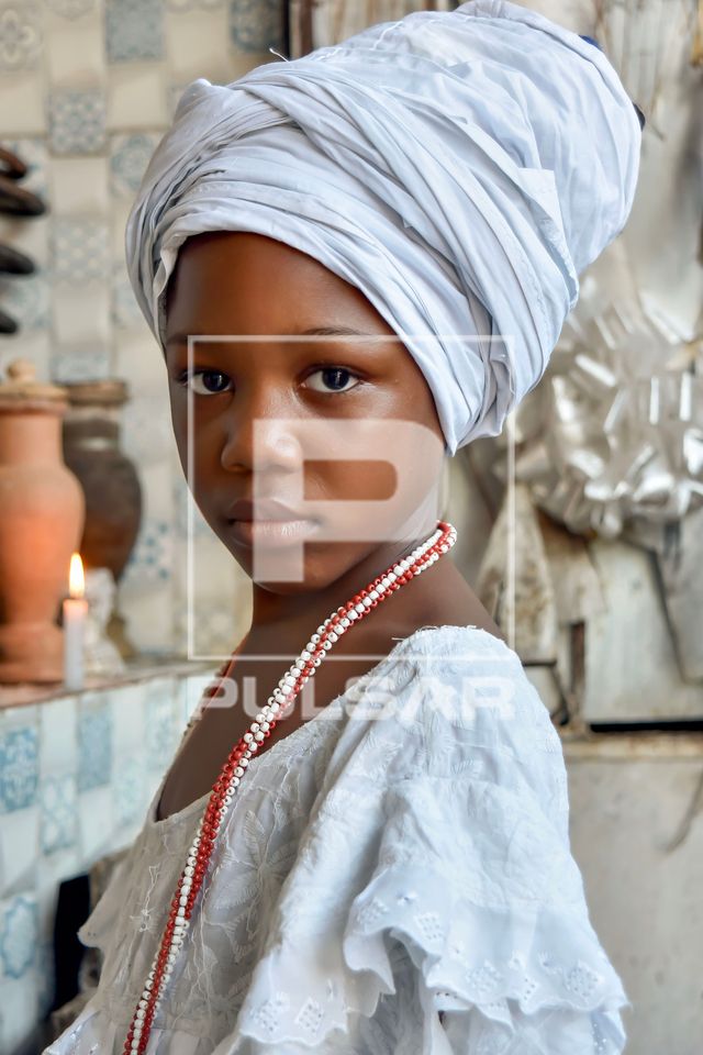Retrato de criança no terreiro de candomblé - Ilè Àse Ojú Onirè ou Oju Onirê