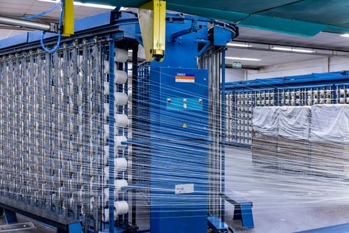 Setor de máquinas urdideiras de indústria têxtil